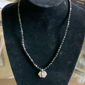 16” black bead choker necklace with a 1/2” silver butterfly drop